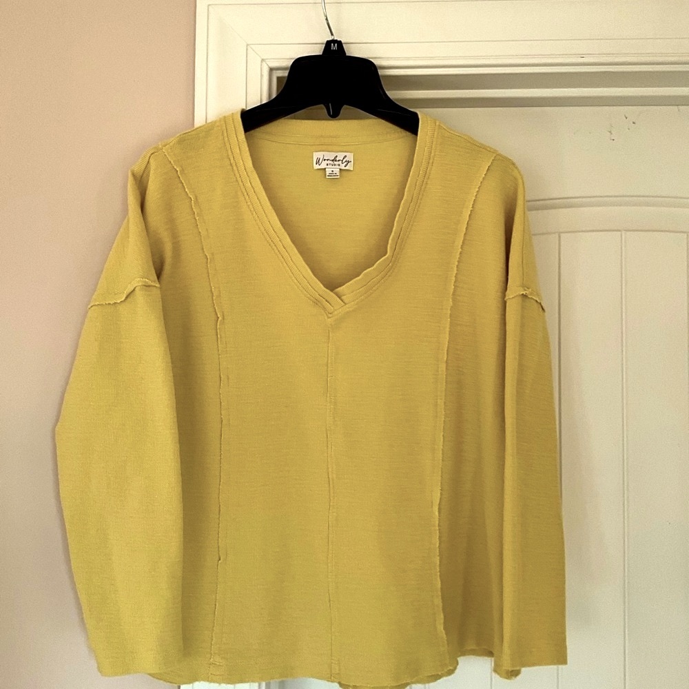 Yellow top, cute with jeans or leggins.